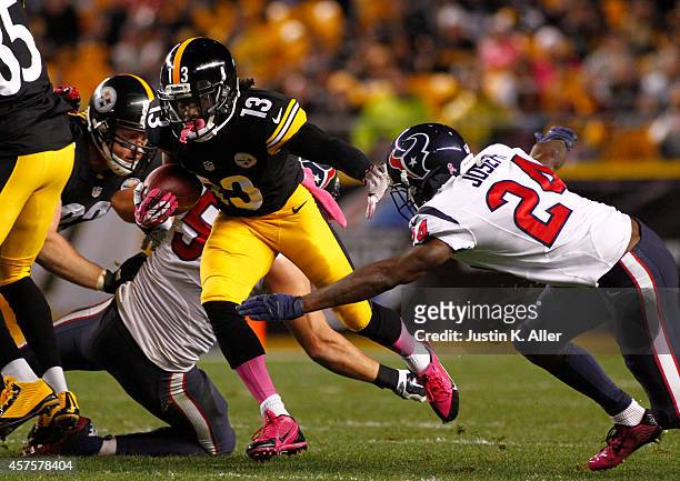 Dri Archer of the Pittsburgh Steelers rushes during the game against Johnathan Joseph of the Houston Texans on October 20, 2014 at Heinz Field in...