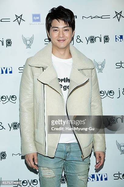 South Korean actor Kim Ji-Hoon poses for photographs at the Steve J and Yoni P show as part of Seoul Fashion Week S/S 2015 at DDP on October 20, 2014...