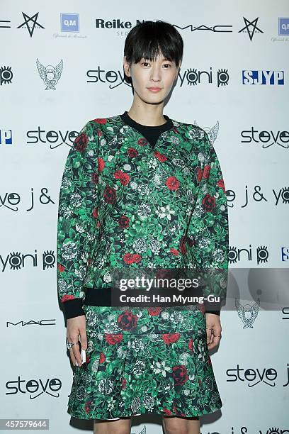 South Korean actress Lee Young-Jin poses for photographs at the Steve J and Yoni P show as part of Seoul Fashion Week S/S 2015 at DDP on October 20,...