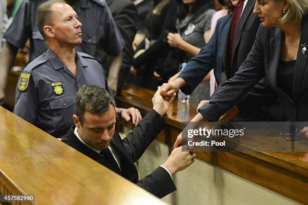 Oscar Pistorius leaves the Pretoria High Court after he is sentenced on October 21 in Pretoria, South Africa. Judge Thokozile Masipa handed down her...