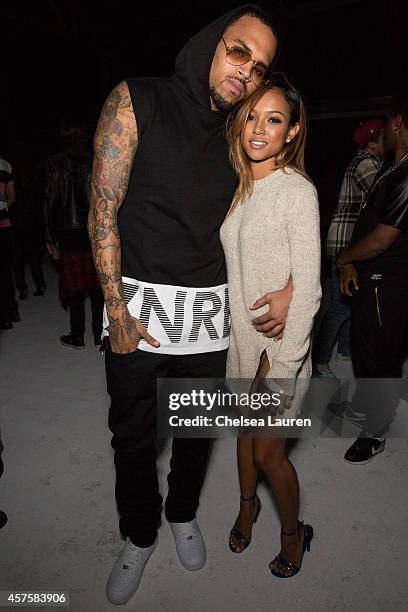 Recording artist Chris Brown and model Karrueche Tran attend Teyana Taylor's VII listening event presented by Def Jam, GOOD Music and MVD Inc at...