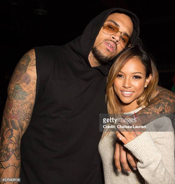 Recording artist Chris Brown and model Karrueche Tran attend Teyana Taylor's VII listening event presented by Def Jam, GOOD Music and MVD Inc at...