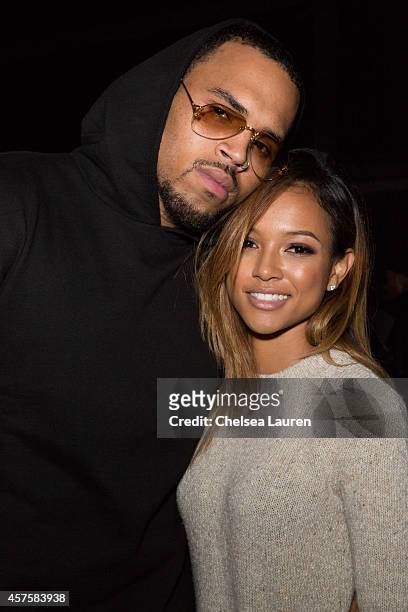 Recording artist Chris Brown and model Karrueche Tran attend Teyana Taylor's VII listening event presented by Def Jam, GOOD Music and MVD Inc at...