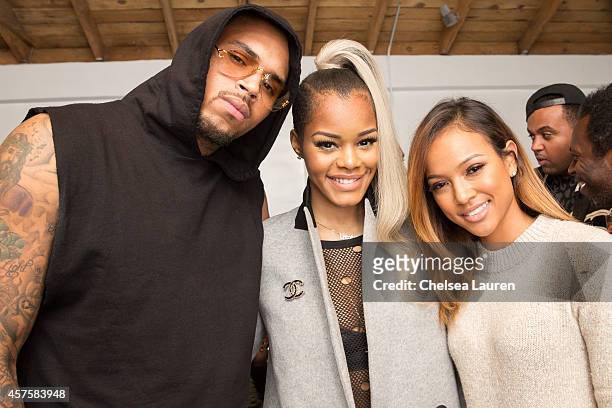 Recording artist Chris Brown, recording artist Teyana Taylor and model Karrueche Tran attend Teyana Taylor's VII listening event presented by Def...