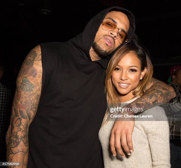 Recording artist Chris Brown and model Karrueche Tran attend Teyana Taylor's VII listening event presented by Def Jam, GOOD Music and MVD Inc at...