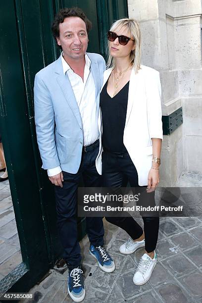 Galerist Emmanuel Perrotin and companion Anne Sophie Mignaux attend the 'Picasso National Museum - Paris' : Reopening party on October 19, 2014 in...