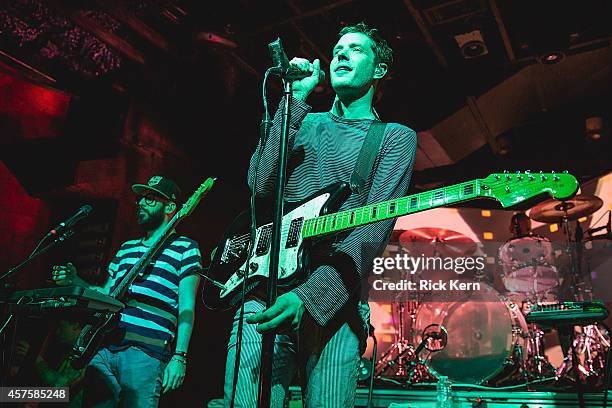 Musicians Tim Nordwind and Damian Kulash of OK Go perform in concert at The Parish on October 20, 2014 in Austin, Texas.