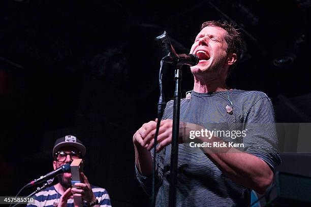 Musicians Tim Nordwind and Damian Kulash of OK Go perform in concert at The Parish on October 20, 2014 in Austin, Texas.