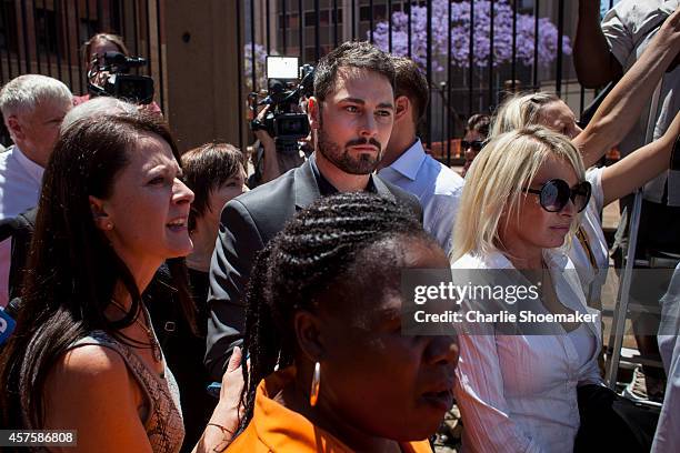 Carl Pistorius, brother of Oscar Pistorius, leaves the North Gauteng High Court on October 21, 2014 in Pretoria, South Africa. Pistorius has been...