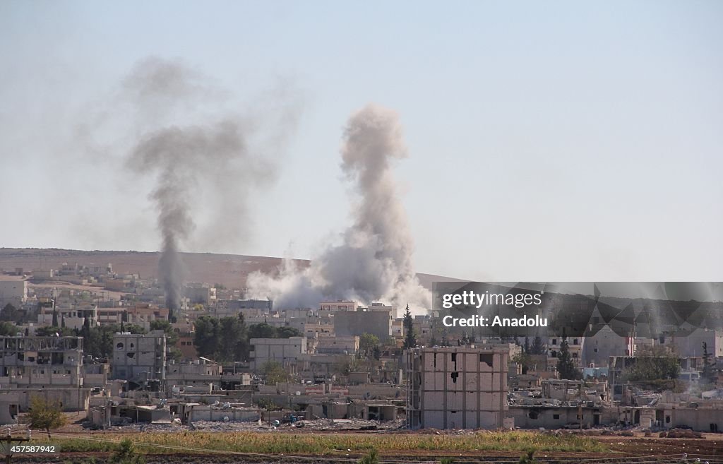 Smoke rising in Kobani seen from Turkey's Sanliurfa