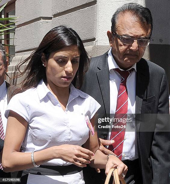 Anni Dewani's cousin, Sneha Mashru with Anni's father Vinod Hindocha outside the Western Cape High Court on October 21, 2014 in Cape Town, South...