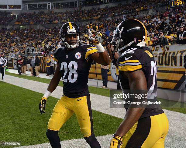 Cornerbacks Cortez Allen and William Gay of the Pittsburgh Steelers celebrate after defending on a pass play during a game against the Houston Texans...