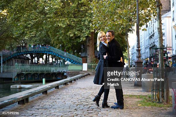 Tv presenter Nikos Aliagas and his wife Tina Grigoriou are photographed for Paris Match on October 10, 2014 in Paris, France.