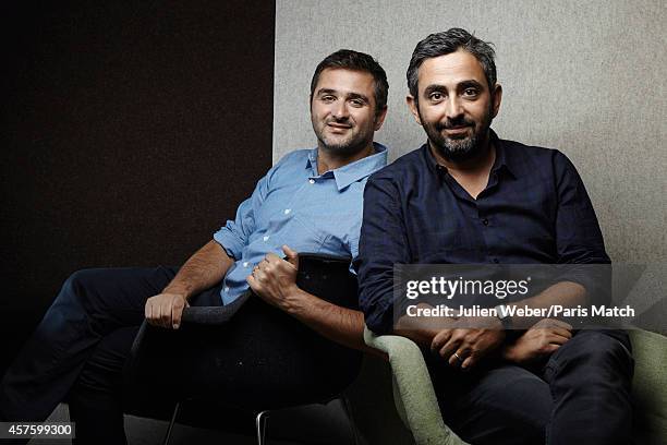 Film directors Olivier Nakache and Eric Toledano are photographed for Paris Match on September 24, 2014 in Paris, France.