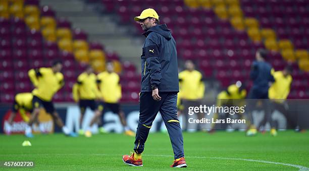 Head coach Juergen Klopp looks on during a Borussia Dortmund training session ahead of their Champions League match against Galatasaray AS at Ali...