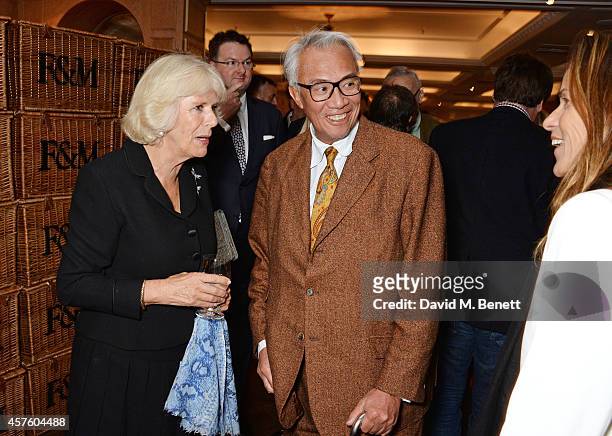 Camilla, Duchess of Cornwall, Sir David Tang and Lucy Tang attend Fortnum & Mason's Diamond Jubilee Tea Salon for the launch of Tom Parker Bowles'...