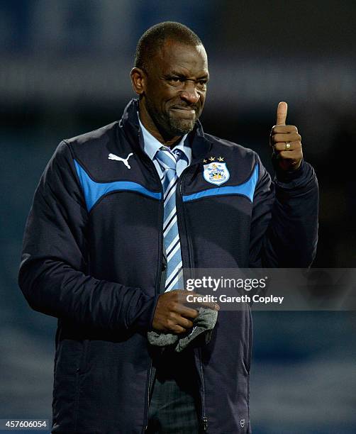 Huddersfield manager Chris Powell celebrates Jacob Butterfield's opening goal during the Sky Bet Championship match between Huddersfield Town and...