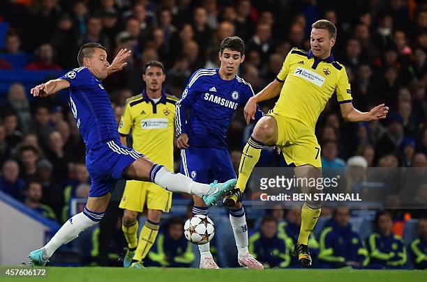 Maribor's defender Ales Mejac vies with Chelsea's English defender John Terry and Chelsea's Brazilian midfielder Oscar during the UEFA Champions...