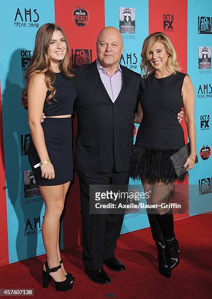 Odessa Chiklis, actor Michael Chiklis and Michelle Moran arrive at the Los Angeles premiere of 'American Horror Story: Freak Show' at TCL Chinese...