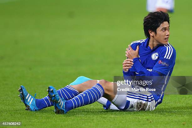 Atsuto Uchida of Schalke reacts during the UEFA Champions League Group G match between FC Schalke 04 and Sporting Clube de Portugal at Veltins Arena...