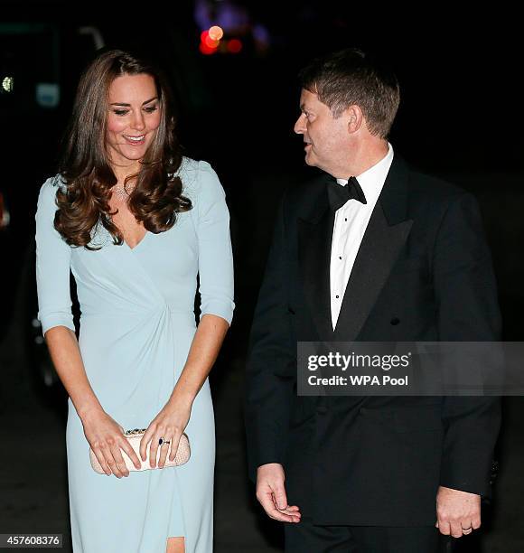 Catherine, Duchess of Cambridge speaks with museum director Michael Dixon upon arrival at the Natural History Museum on October 21, 2014 in London,...