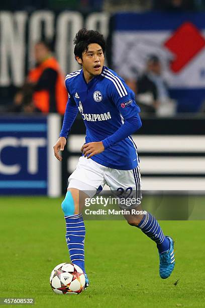 Atsuto Uchida of Schalke on the ball during the UEFA Champions League Group G match between FC Schalke 04 and Sporting Clube de Portugal at Veltins...