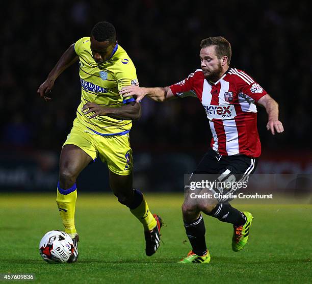 Jose Semedo of Sheffield Wednesday looks to get away from Alan Judge of Brentford during the Sky Bet Championship match between Brentford and...