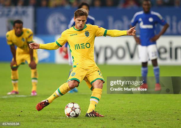 Adrien Silva of Sporting Lisbon scores their second goal from the penalty spot during the UEFA Champions League Group G match between FC Schalke 04...