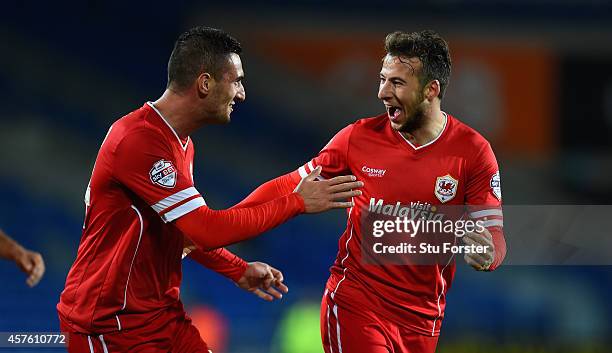 Cardiff player Federico Macheda celebrates with scorer of the third Cardiff goal Adam Le Fondre during the Sky Bet Championship match between Cardiff...