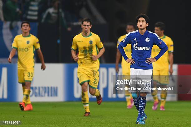 Atsuto Uchida of Schalke reacts during the UEFA Champions League Group G match between FC Schalke 04 and Sporting Clube de Portugal at Veltins Arena...