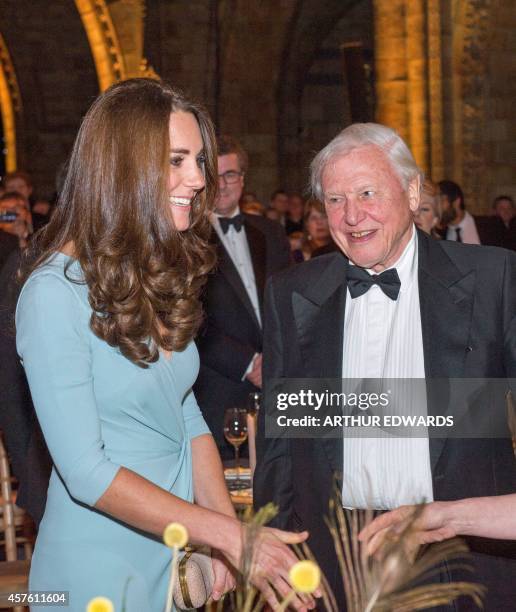 Britain's Catherine, Duchess of Cambridge, Patron of The Natural History Museum with Sir David Attenborough as she attends the Wildlife Photographer...