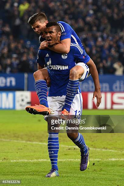 Maxim Choupo-Moting of Schalke celebrates scoring their fourth goal with Klaas Jan Huntelaar of Schalke during the UEFA Champions League Group G...