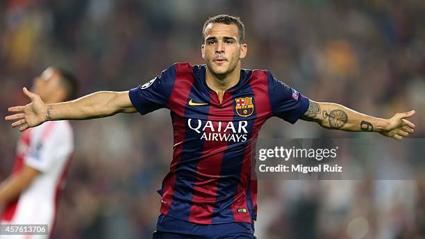 Sandro of FC Barcelona celebrates the third goal during the UEFA Champions League match between FC Barcelona and AFC Ajax on October 21, 2014 in...