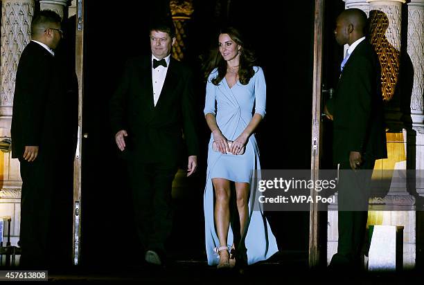 Patron of The Natural History Museum, Catherine, Duchess of Cambridge walks with museum director Michael Dixon ats she leaves the Natural History...