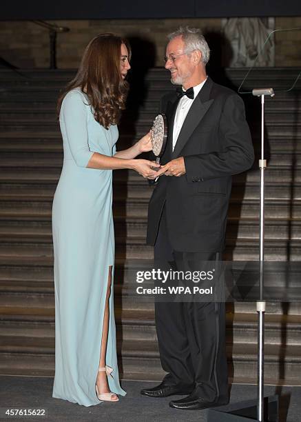 Patron of The Natural History Museum, Catherine, Duchess of Cambridge presents the Wildlife Photographer of the Year award to Michael Nichols at the...