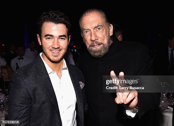 Kevin Jonas and Co-Founder, Chairman and CEO of John Paul Mitchell Systems and Co-Founder of Patron Tequila and Spirits John Paul DeJoria attend the...