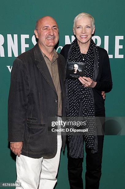 Annie Lennox and Anthony DeCurtis pose at Barnes & Noble Union Square on October 21, 2014 in New York City.