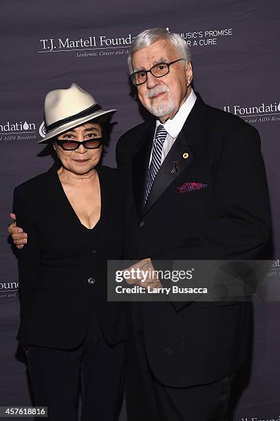 Yoko Ono and T.J. Martell Foundation founder and chairman Tony Martell pose backstage at the T.J. Martell Foundation's 39th Annual New York Honors...