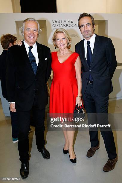 Miss Alain Flammarion standing between Jean-Gabriel Mitterrand and his son Edward Mitterrand attend the 'Diner des Amis du Musee d'Art Moderne' at...