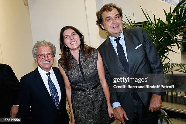 Laurent Dassault, Denise and Alexandre Vilgrain attend the 'Diner des Amis du Musee d'Art Moderne' at Musee d'Art Moderne on October 21, 2014 in...