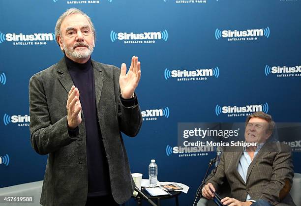 Singer-songwriter Neil Diamond and radio personality Bruce "Cousin Brucie" Morrow visit the SiriusXM Studios on October 21, 2014 in New York City.