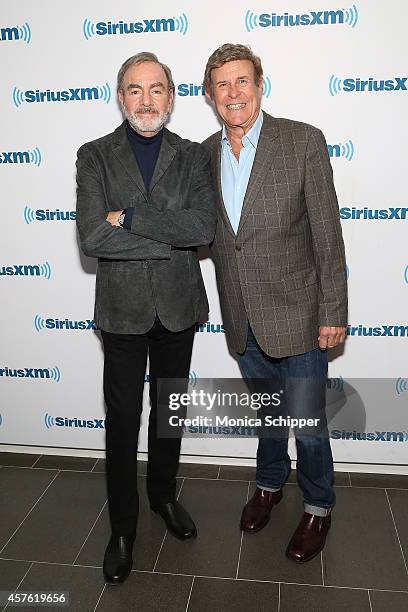 Singer-songwriter Neil Diamond and radio personality Bruce "Cousin Brucie" Morrow visit the SiriusXM Studios on October 21, 2014 in New York City.