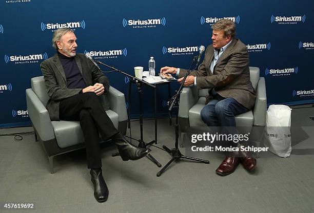 Singer-songwriter Neil Diamond and radio personality Bruce "Cousin Brucie" Morrow visit the SiriusXM Studios on October 21, 2014 in New York City.