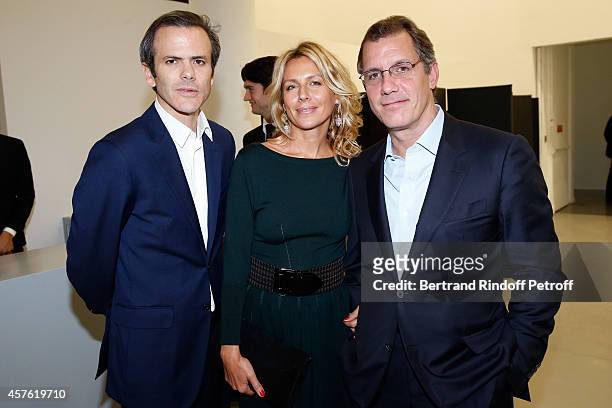 Guillaume Houze and Guest attend the 'Diner des Amis du Musee d'Art Moderne' at Musee d'Art Moderne on October 21, 2014 in Paris, France.