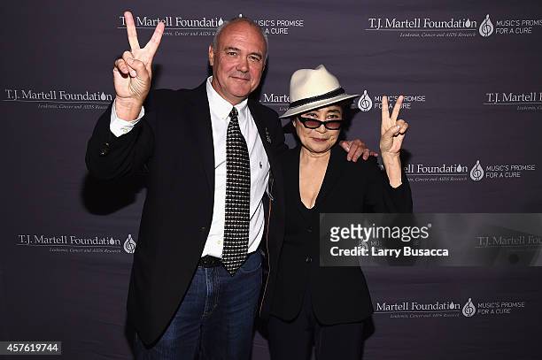 President and CEO, Hard Rock International Hamish Dodds and Yoko Ono pose backstage at the T.J. Martell Foundation's 39th Annual New York Honors Gala...