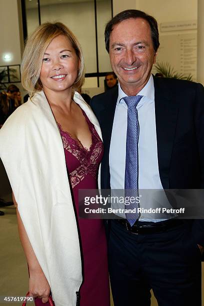 Michel Edouard Leclerc and Natalia Olzoeva attend the 'Diner des Amis du Musee d'Art Moderne' at Musee d'Art Moderne on October 21, 2014 in Paris,...