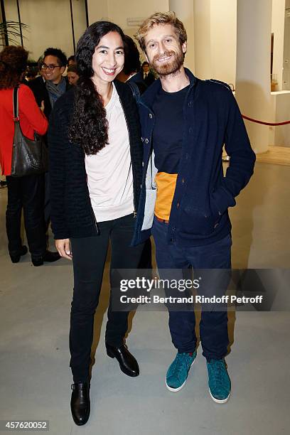 Artists Latifa Echakhch and Petrit Halilaj attend the 'Diner des Amis du Musee d'Art Moderne' at Musee d'Art Moderne on October 21, 2014 in Paris,...