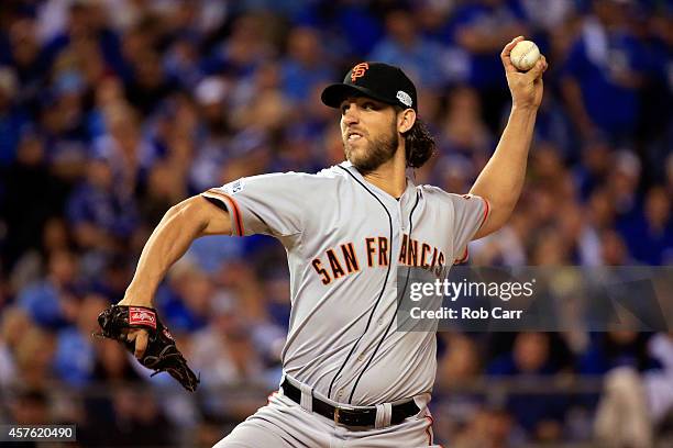 Madison Bumgarner of the San Francisco Giants pitches in the first inning against the Kansas City Royals during Game One of the 2014 World Series at...