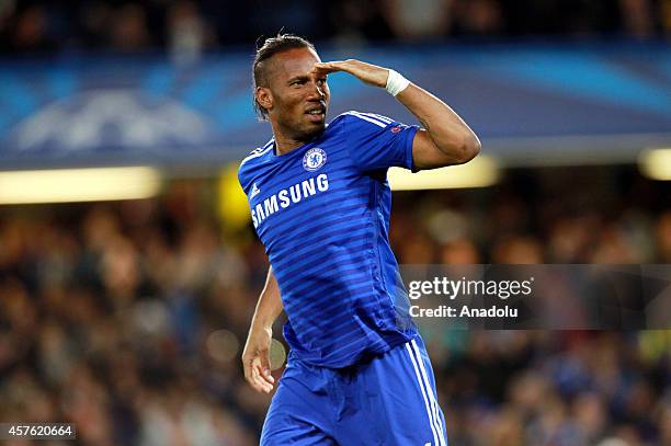 Didier Drogba of Chelsea celebrates after scoring a goal from the penalty spot during the UEFA Champions League Group G soccer match between Chelsea...