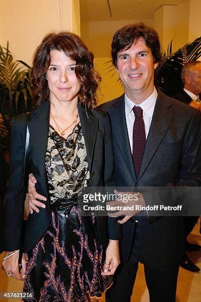 Camille Miceli and her husband Jerome attend the 'Diner des Amis du Musee d'Art Moderne' at Musee d'Art Moderne on October 21, 2014 in Paris, France.